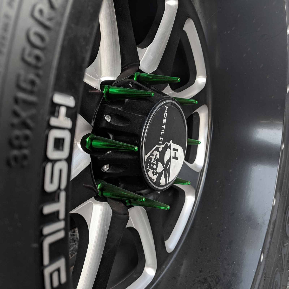 Green | 12x1.25mm Extended Spike Lug Nuts - Acorn Taper - 50 Caliber Racing - Green Spikes Installed