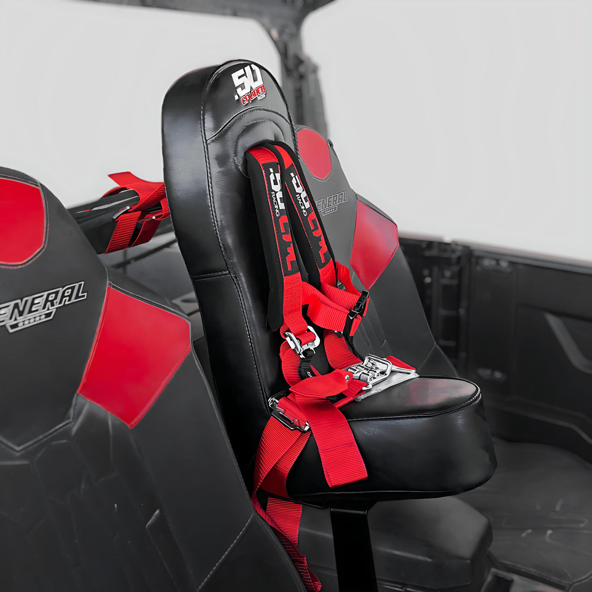 Add an extra seat for your little one in your Polaris General – complete with 50 Caliber Racing harness