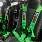 Venom Green | Green 4-point UTV harness, 3" main straps, latch-style quick release, shown installed in Kawasaki KRX
