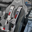 Ghost Gray | Silver 4-point UTV harness, 3" main straps, latch-style quick release, shown installed in UTV