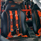 Blaze Orange | Orange 4-point UTV harness, 3" main straps, latch-style quick release, shown installed in Maverick X3