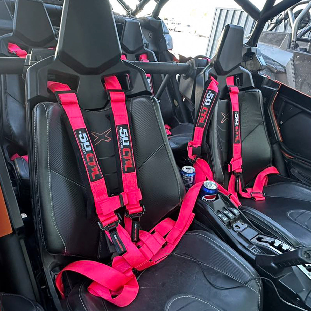 Rogue Pink | Pink | 50 Caliber Racing Pro Series 4-point UTV harness installed on UTV seat Pink