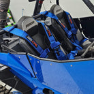 Nitro Blue | Blue | 50 Caliber Racing Pro Series 4-point UTV harness installed on UTV seat Blue