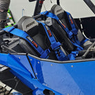 Nitro Blue | 50 Caliber Racing Pro Series 4-point UTV harness installed on UTV seat Blue