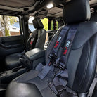 Stealth Black | 50 Caliber Racing Pro Series 4-point UTV harness installed on UTV seat Black